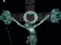 3gp video zdarma: 825KB, Ježíš Kristus na kříži a za ním vrčí v temné noci elektrický transformátor, Třeboň, June 2007